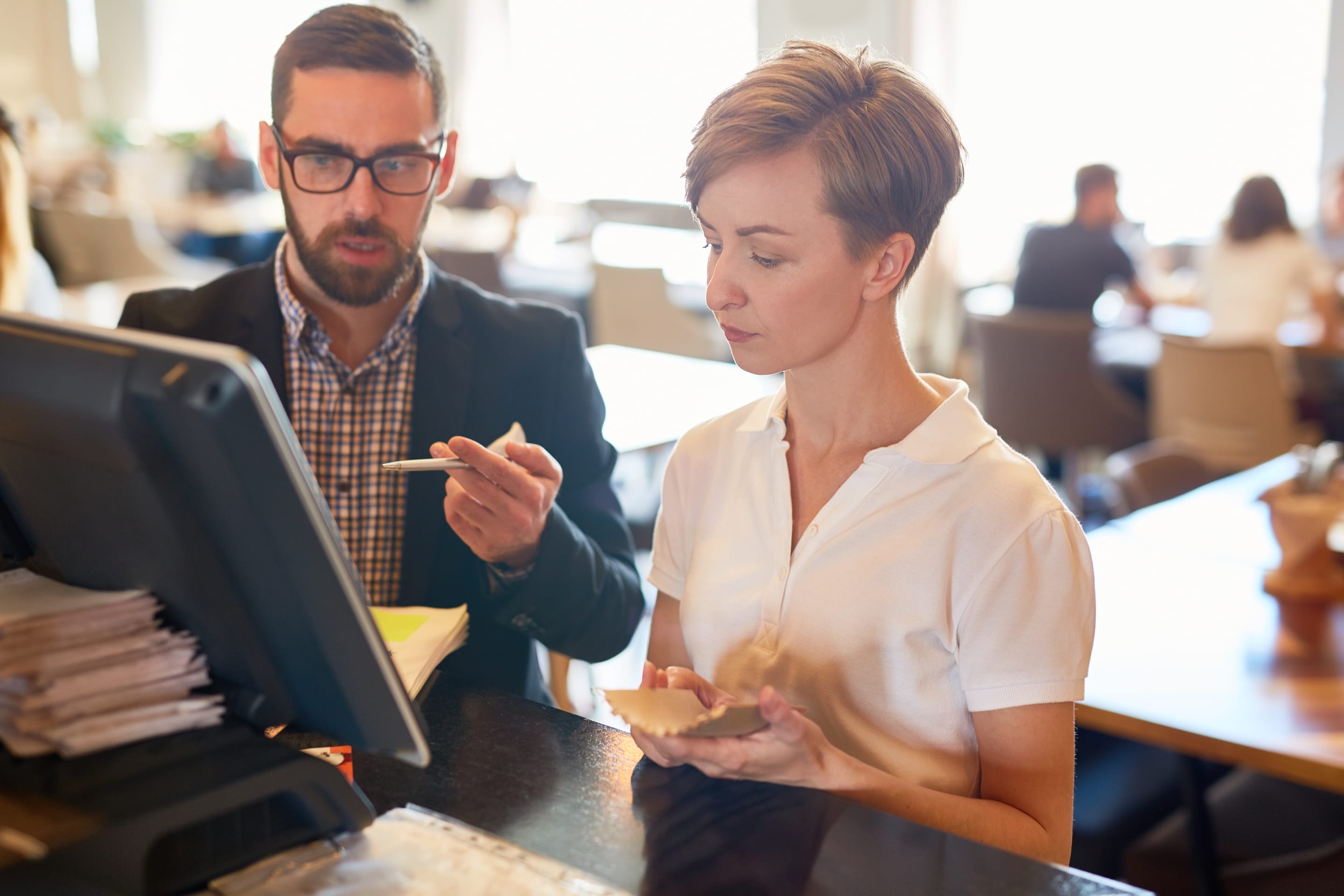business people meeting around table with charts